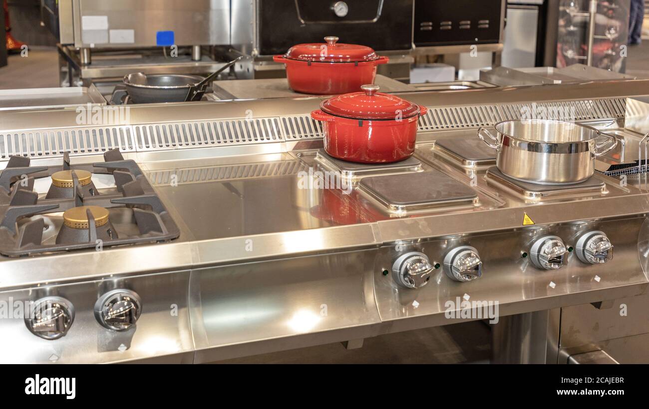 Electric and Gas Burning Stove in Restaurant Kitchen Stock Photo Alamy