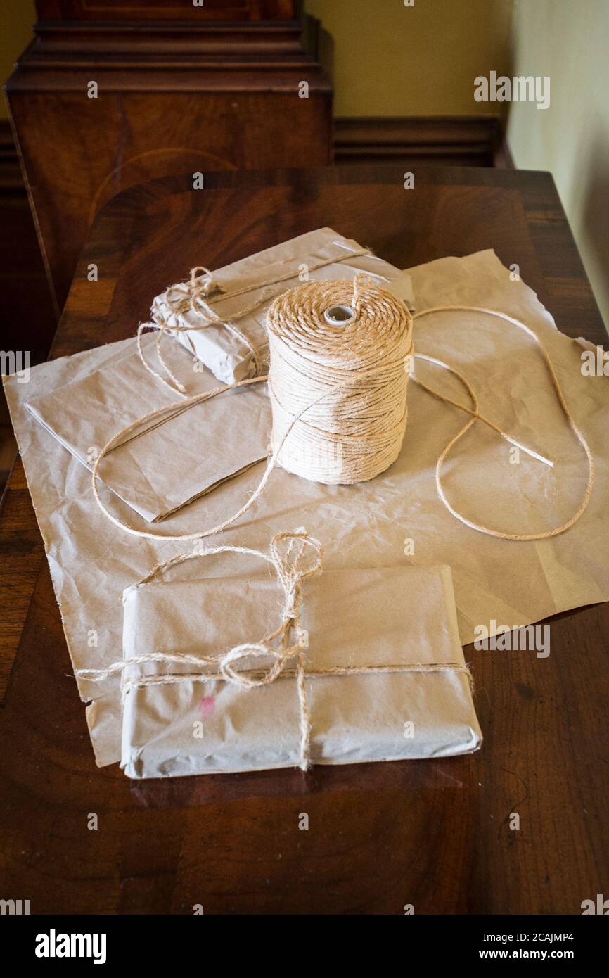 Oldfashioned string and wrapped up parcels Stock Photo Alamy
