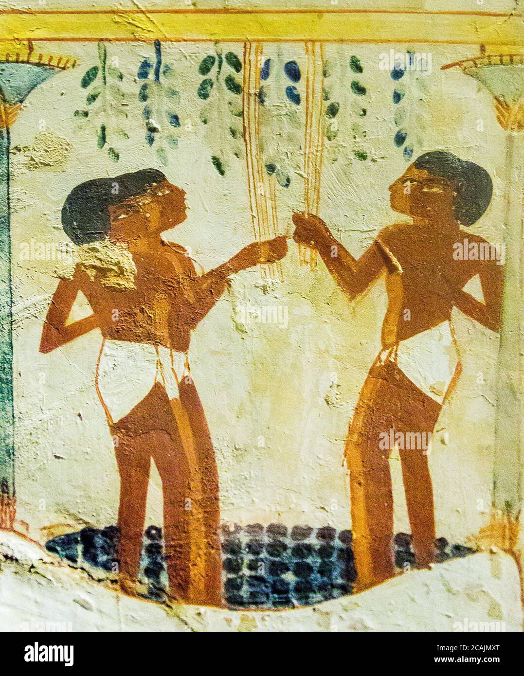 UNESCO World Heritage, Thebes in Egypt, Valley of the Nobles, tomb of Nakht. Treading grapes. Stock Photo