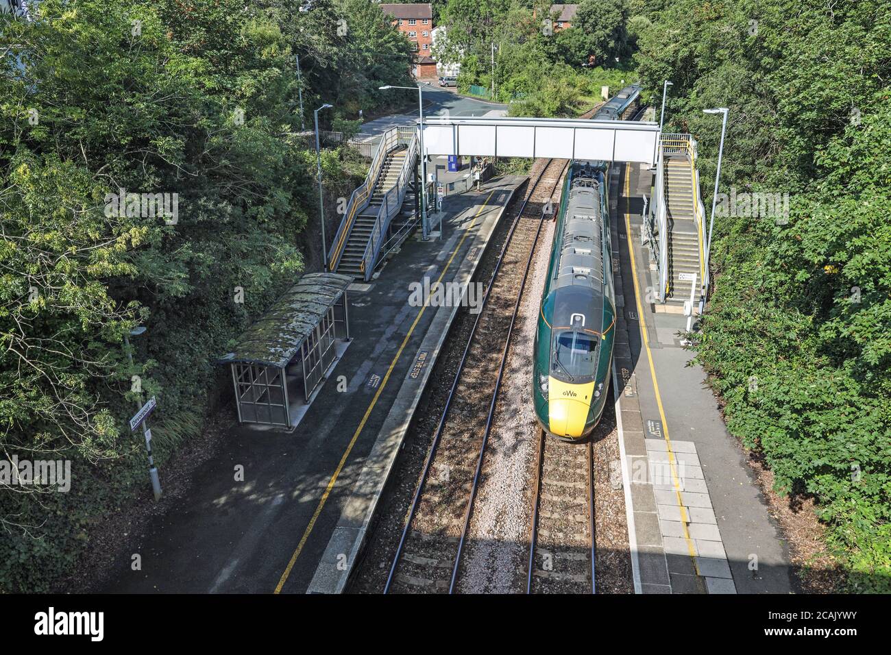 A Great Western Railway train travels through Devonport Station in Plymouth Stock Photo