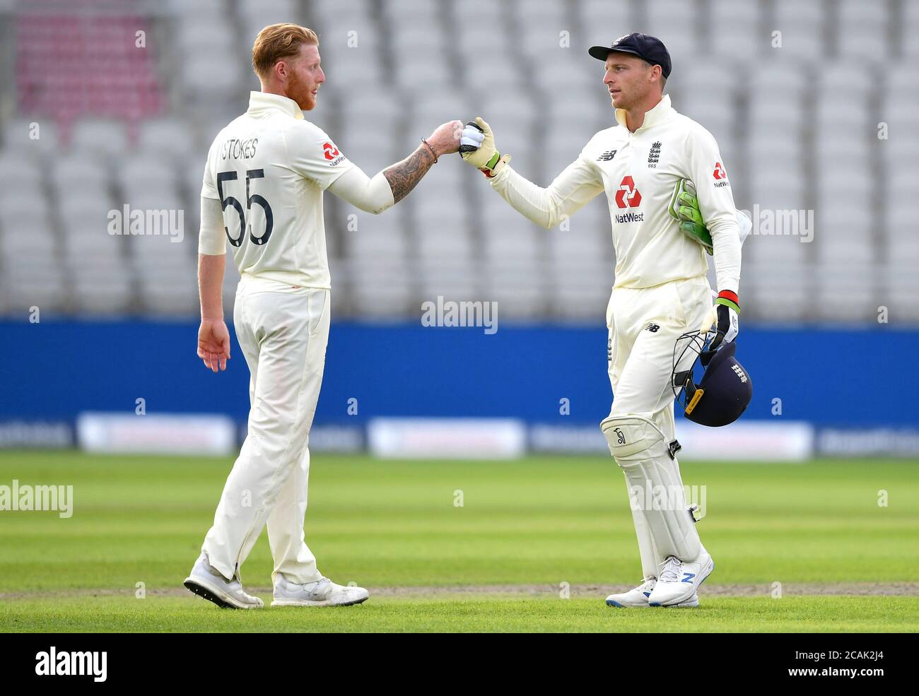 England S Ben Stokes Left And Jos Buttler At The End Of Play During Day Three Of The First Test Match At The Emirates Old Trafford Manchester Stock Photo Alamy