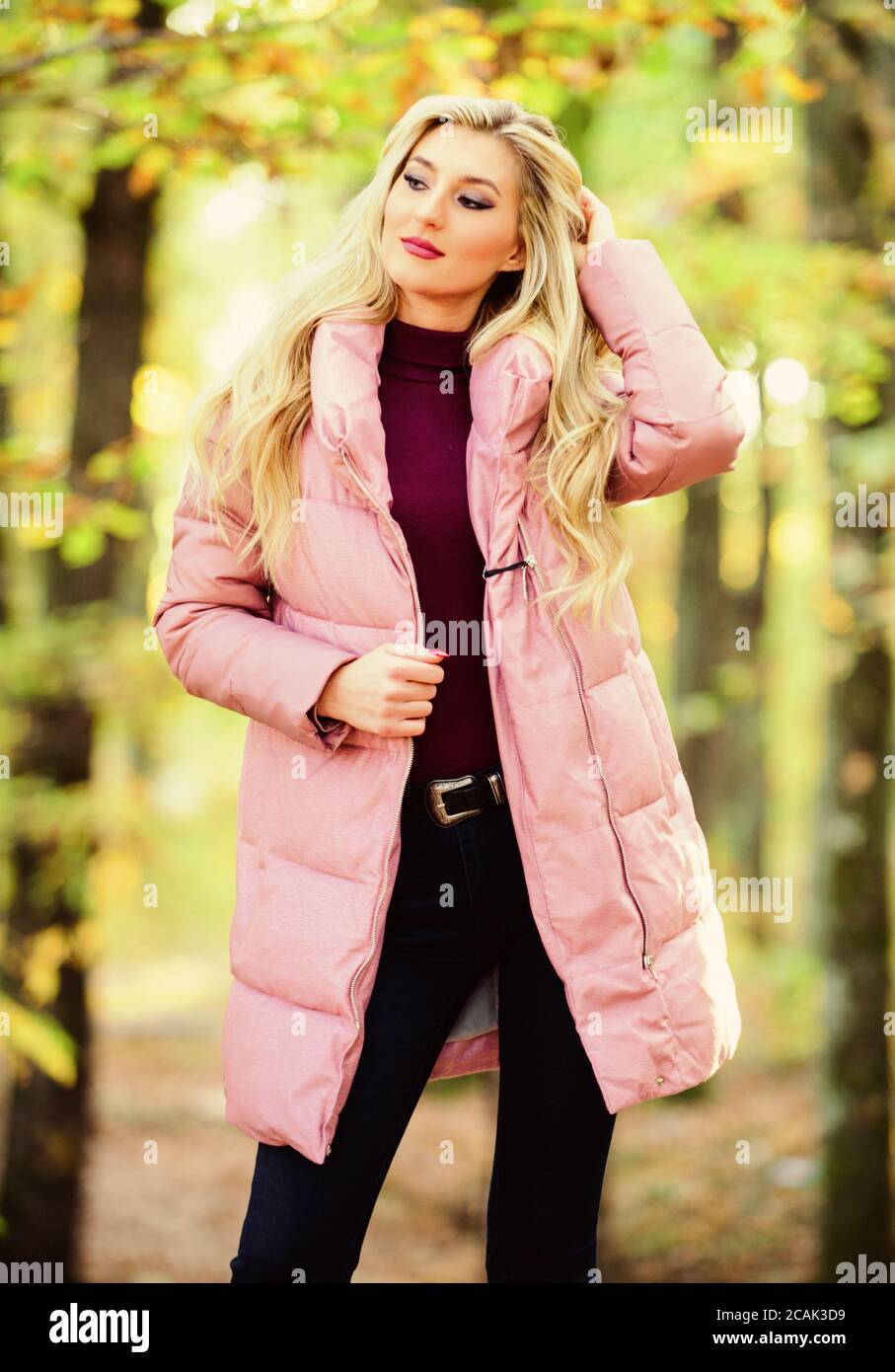 How To Rock Puffer Jacket Like Star. Puffer Fashion Trend Concept. Girl  Fashionable Blonde Walk in Autumn Park Stock Image - Image of attractive,  coat: 158270653