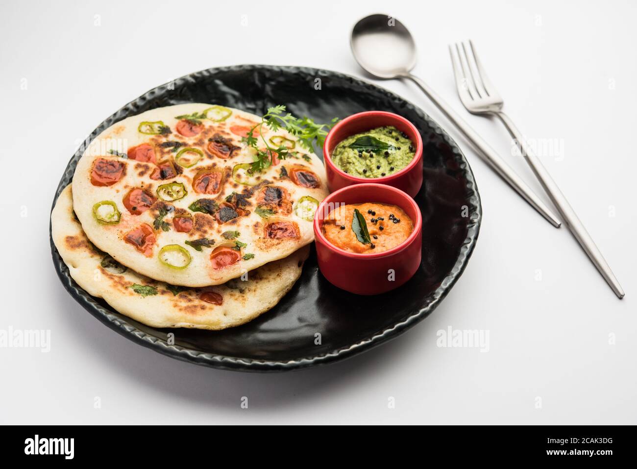 Uthappam or uttapam is a type of dosa from South India which is thicker