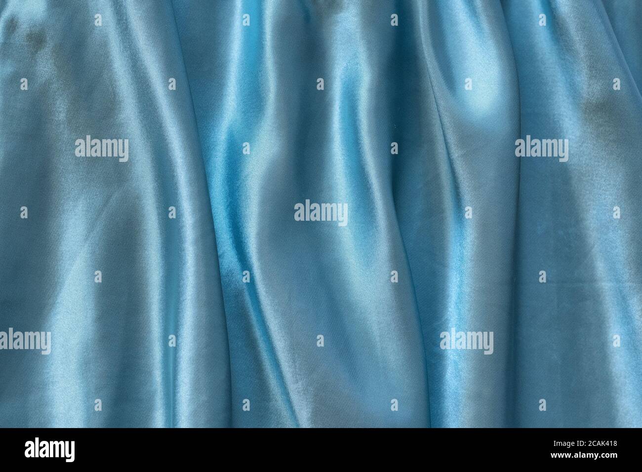 Closeup blue satin silk fabric hi-res stock photography and images - Alamy