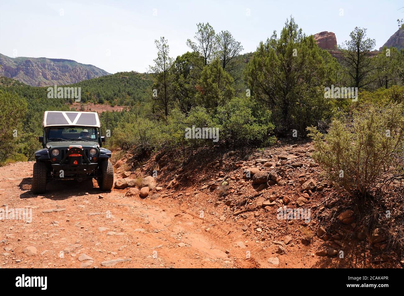 Off road vehicles play on the backroad trails in Sedona Arizona Stock Photo