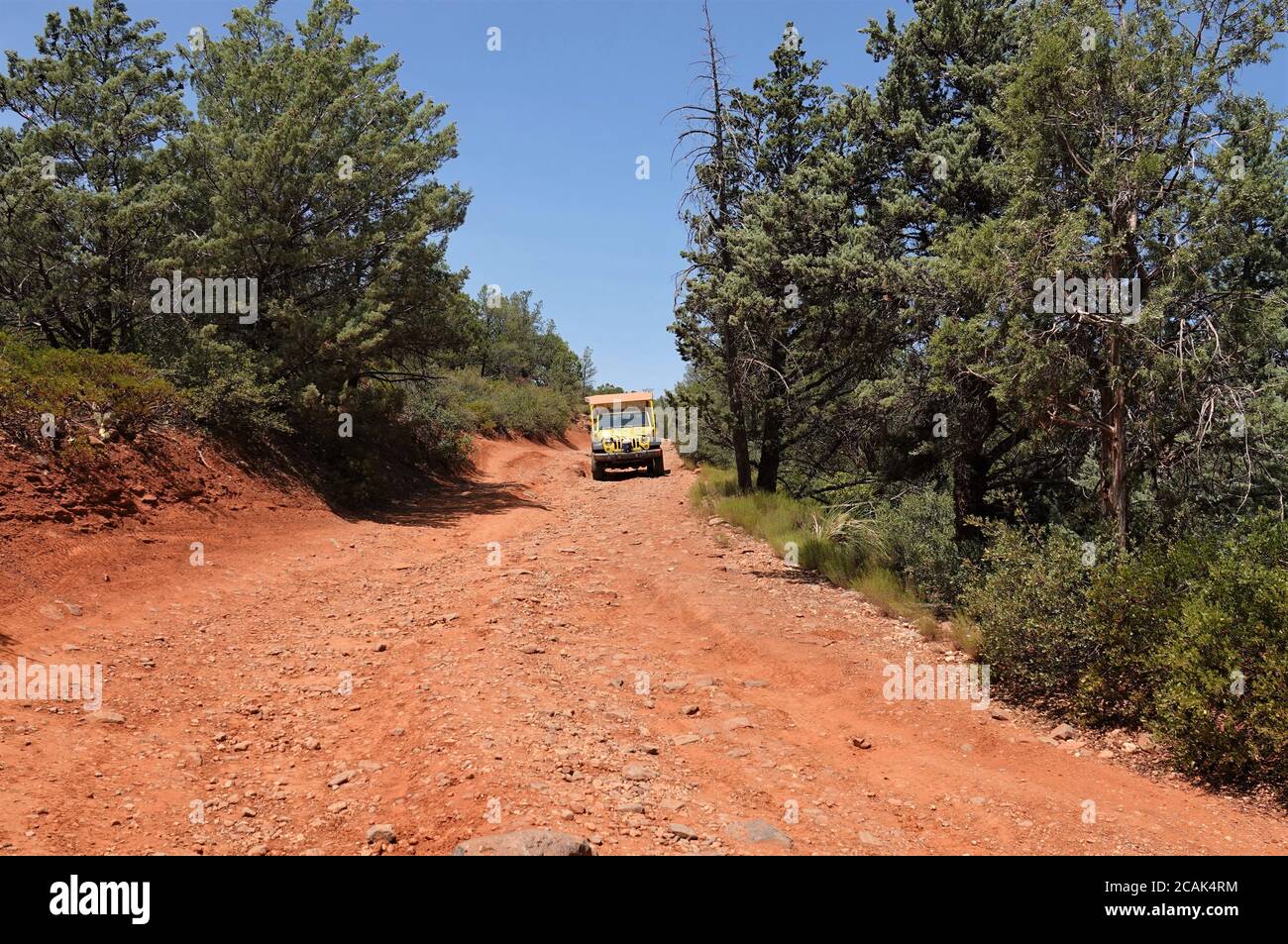 Off road vehicles play on the backroad trails in Sedona Arizona Stock Photo