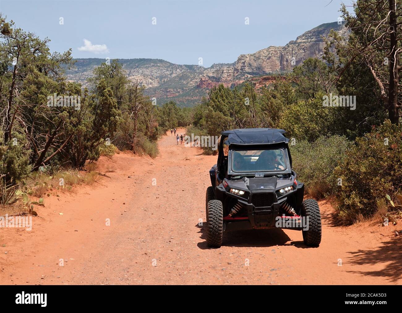 Off road vehicles play on the backroad trails in Sedona Arizona Stock