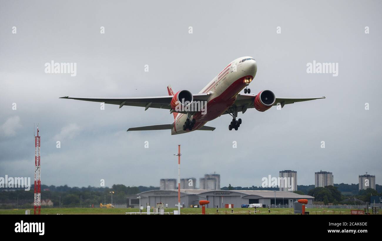 Glasgow, Scotland, UK. 7th Aug, 2020. Pictured: Air India Flight AI1133 from Mumbai which landed at Glasgow International Airport transporting a film crew and cast is seen returning today back to Mumbai. The plane is a Boeing 777-237(LR) aircraft. The film crew who landed last night are to be quarantined for 14 days before starting filming in Ayrshire later this month with Bollywood blockbuster, Bell Bottom, where it's reported the 80s' thriller revolves around a plane hijacking. Credit: Colin Fisher/Alamy Live News Stock Photo
