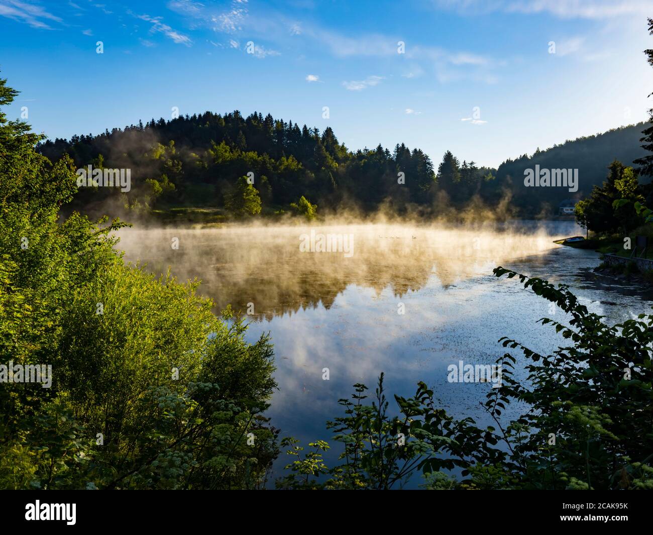 Morning bright mist fog above water surface of Lake Mrzla vodica in Croatia Europe countryside country-side Stock Photo