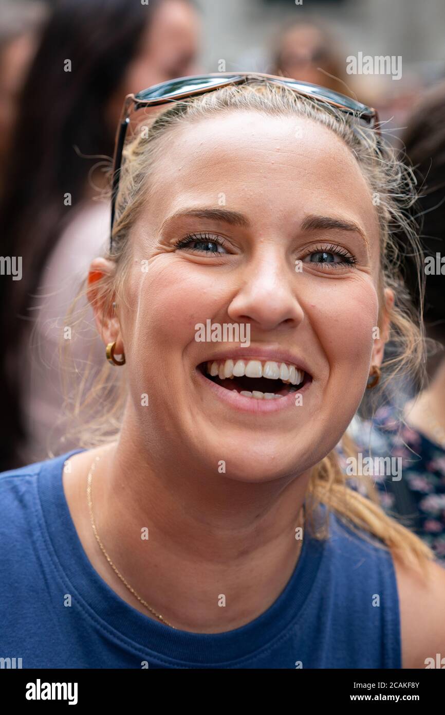 LONDON, ENGLAND - JULY 28, 2020: Beautiful smiling female Johnny Depp fan outside the High Court in London during the Court case against The Sun Newsp Stock Photo