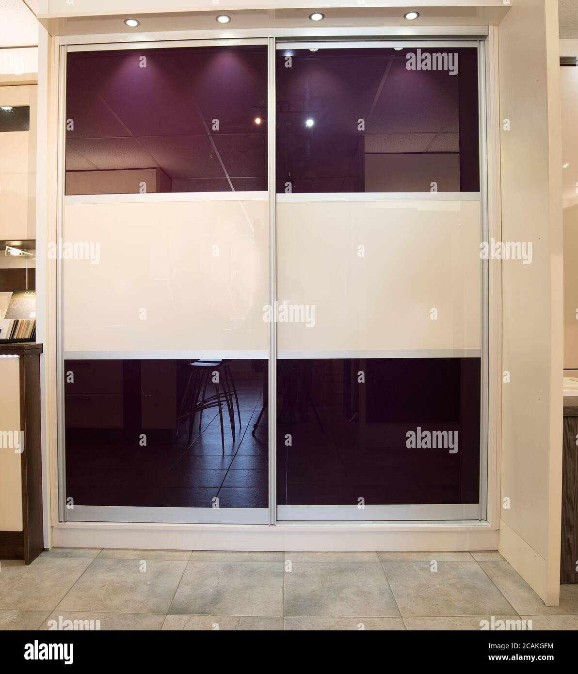 Tall modern bedroom wardrobe example Stock Photo Alamy