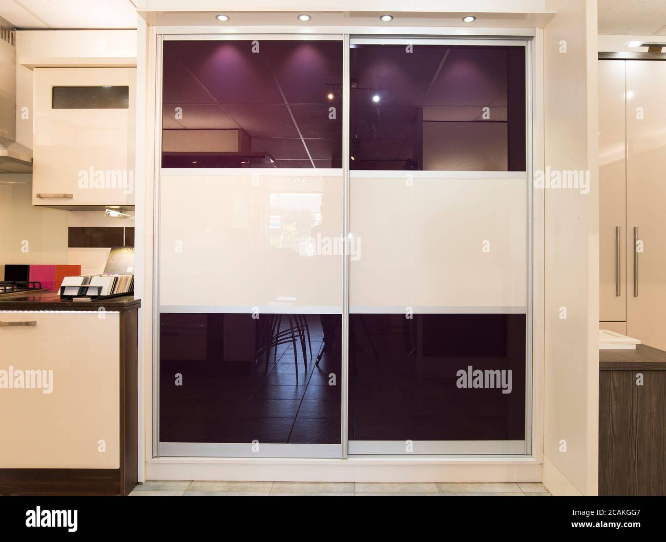 Tall modern bedroom wardrobe example Stock Photo Alamy