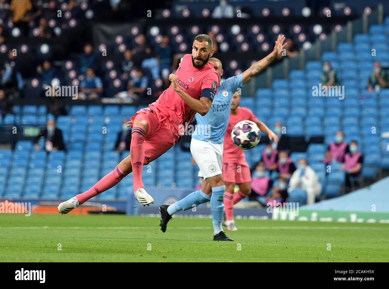 Real Madrid's Karim Benzema shoots towards goal during the UEFA ...