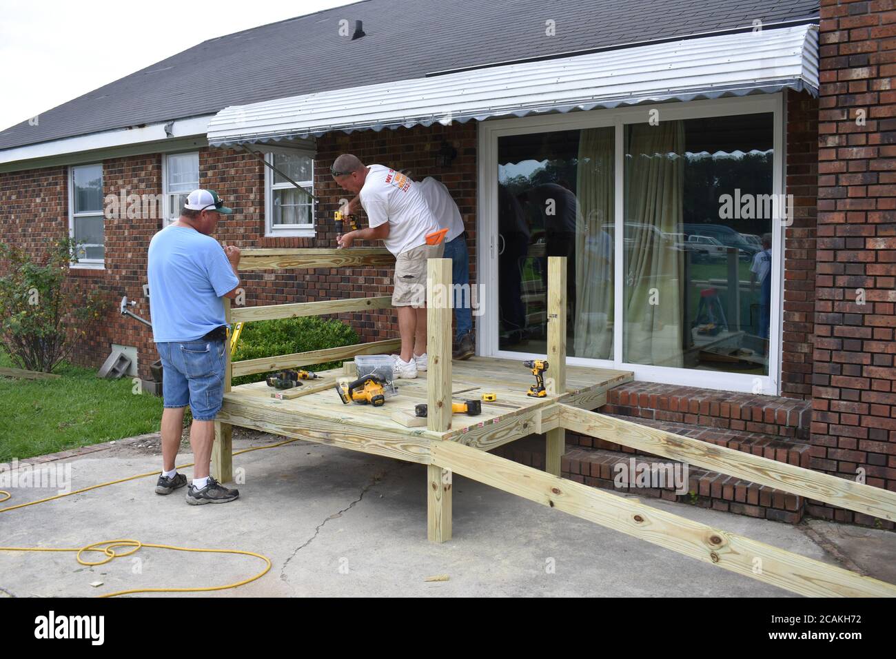 Construction of a Handicap Ramp to make the home wheelchair accessible. Stock Photo