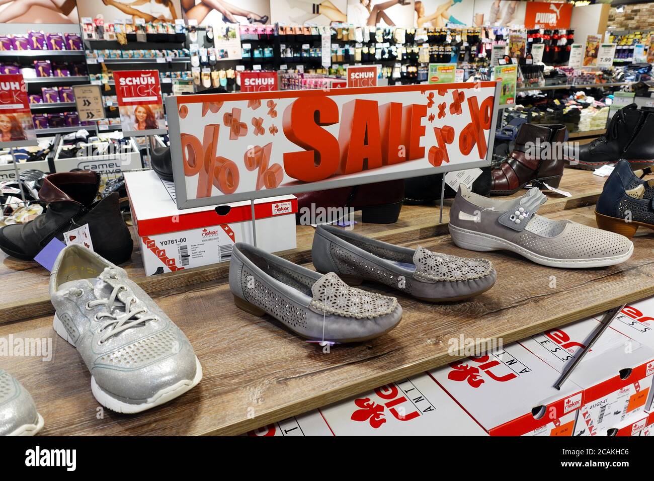 Shoes for sale in a Hypermarket Stock Photo - Alamy