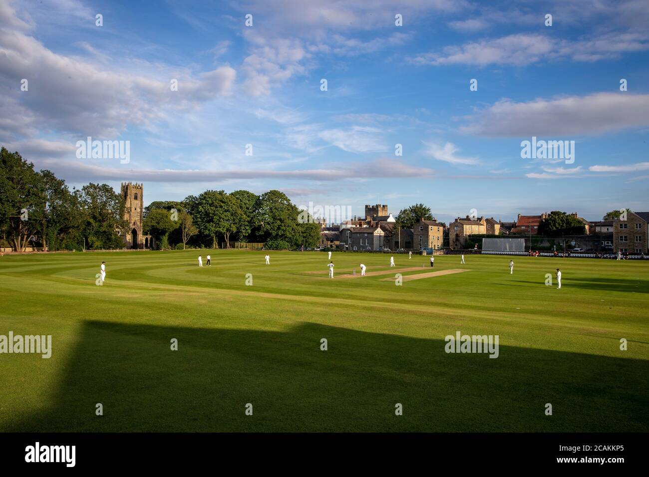 RICHMOND, ENGLAND, AUGUST 6TH 2020 - A general view of the Hurgill Road ground home of Richmondshire Cricket Club with Richmond Castle in the backgrou Stock Photo