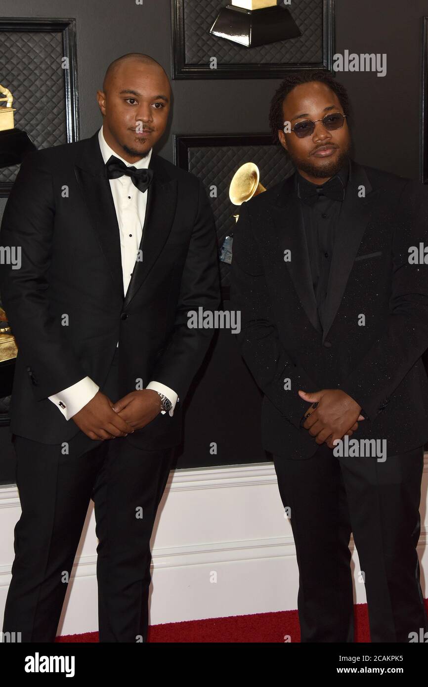 LOS ANGELES - JAN 26:  Khris Riddick-Tynes, Leon Thomas at the 2020 Grammy Awards - Arrivals at the Staples Center on January 26, 2020 in Los Angeles, CA Stock Photo