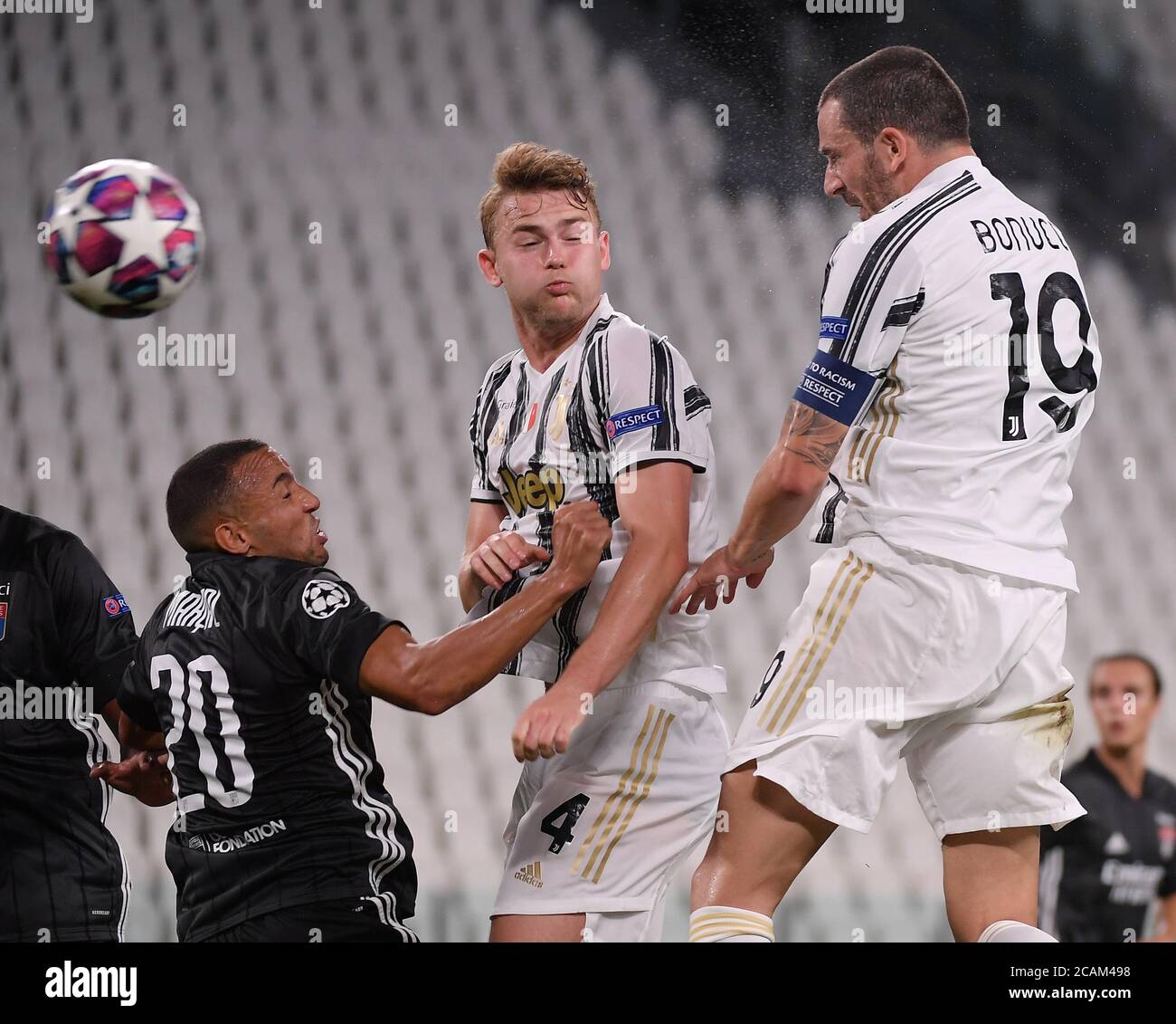 Turin 7th Aug Fc Juventus Leonardo Bonucci R And Matthijs De Ligt C Vies With Olympique Lyonnais S Fernando Marcal During The Uefa Champions League Round Of Sixteen 2nd Leg Match Between