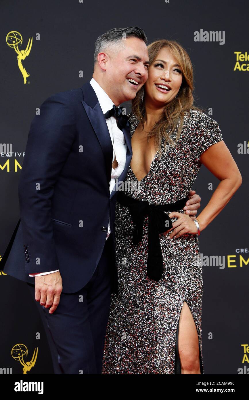 LOS ANGELES - SEP 14:  Raj Kapoor, Carrie Ann Inaba at the 2019 Primetime Emmy Creative Arts Awards at the Microsoft Theater on September 14, 2019 in Los Angeles, CA Stock Photo