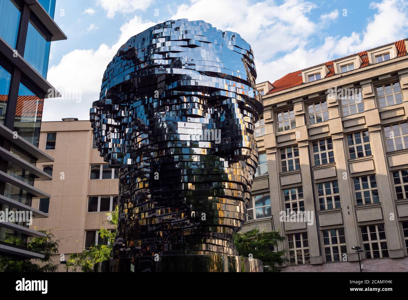Prague, Czech Republc - July 11 2020: Turning Head of Franz Kafka in Czech Hlava Franze Kafky Statue by Davd Cerny Stock Photo