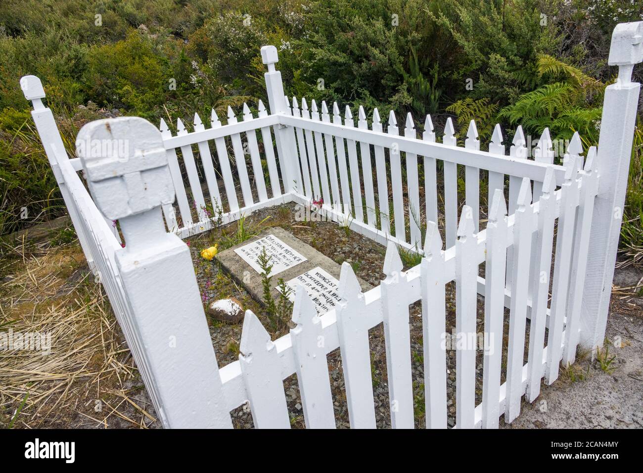 White picket fence around the graves of the children of the Cape Bruny