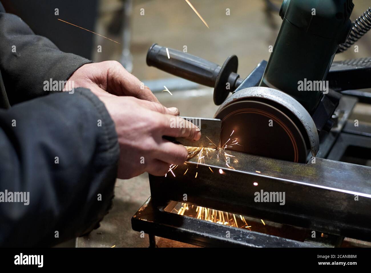 Angle grinder cuts metal bar hi-res stock photography and images - Alamy