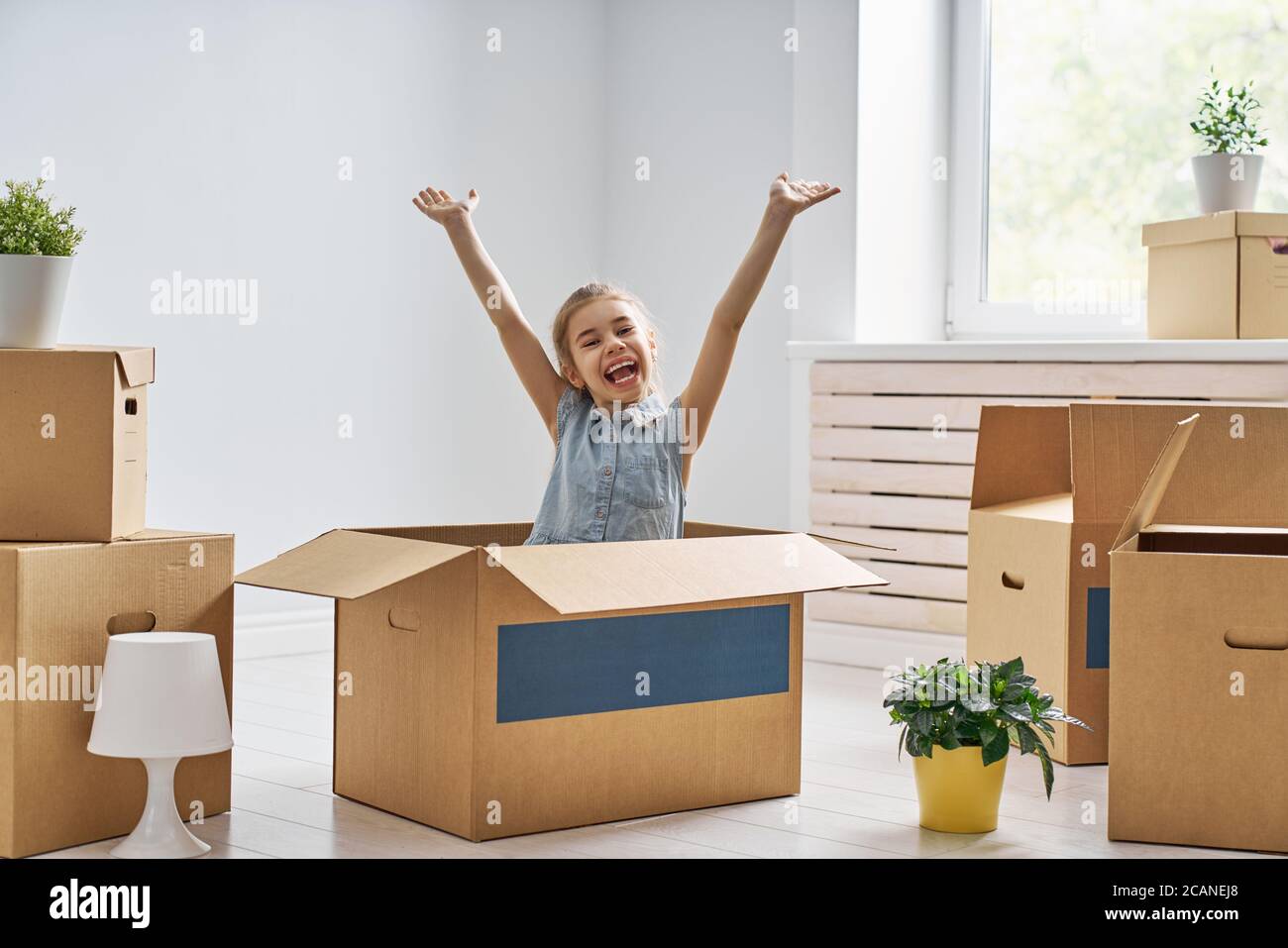 Children With Box Beautiful girl cardboard boxes hi-res stock photography and images - Alamy