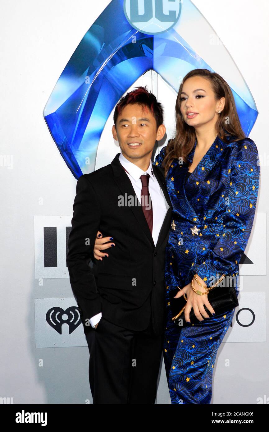 LOS ANGELES - DEC 12:  James Wan, Ingrid Bisu at the 'Aquaman' Premiere at the TCL Chinese Theater IMAX on December 12, 2018 in Los Angeles, CA Stock Photo