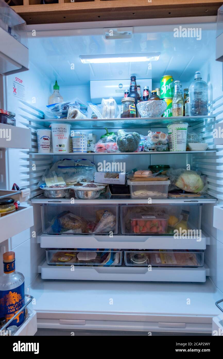looking inside a large double fridge freezer Stock Photo Alamy