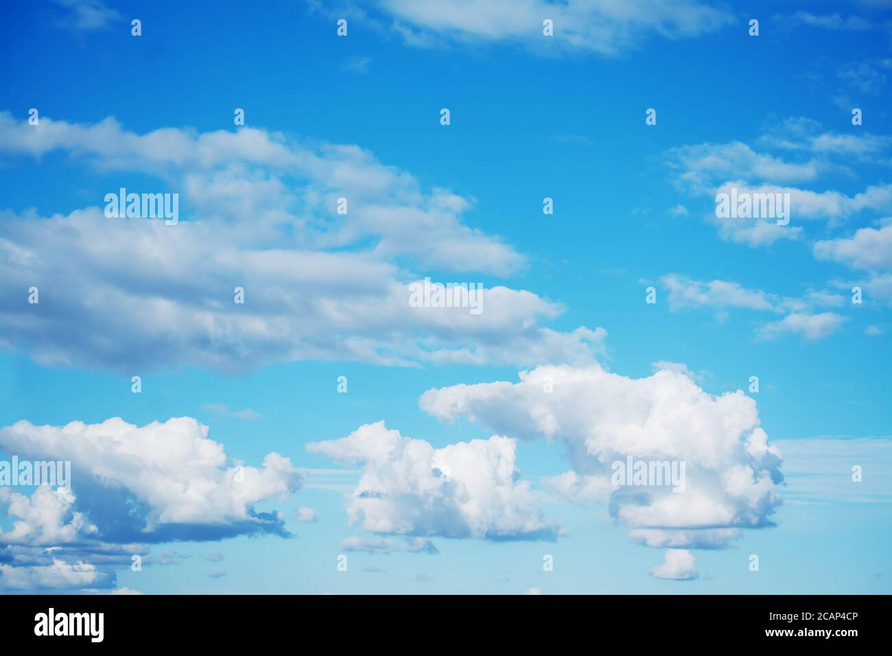 blue sky with white, fluffy clouds Stock Photo - Alamy