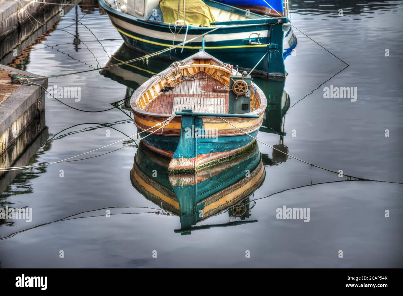 small wooden boat moored in Temo river, Italy Stock Photo - Alamy