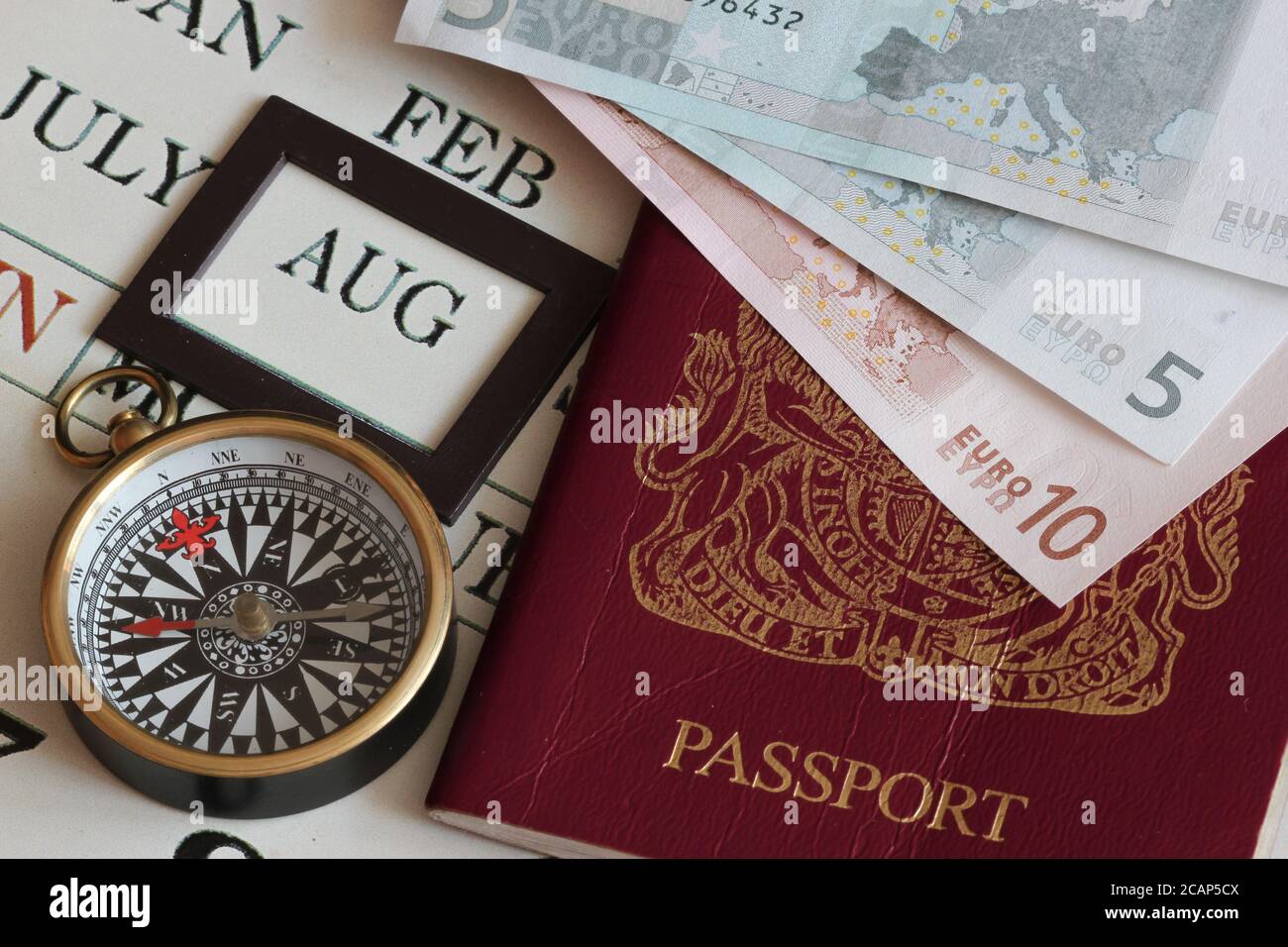 home or abroad passport and euros for travel in August school holidays to europe Stock Photo