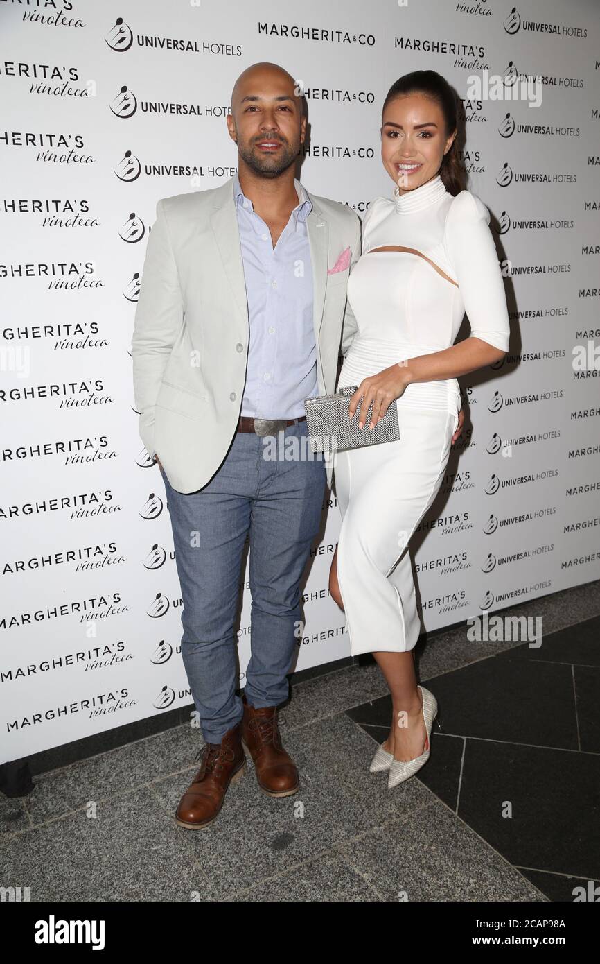 Kane Vato and Pia Muehlenbeck attend the launch of eatery Margherita & Co and Margherita's Vinoteca in Sydney, NSW, Australia. Stock Photo