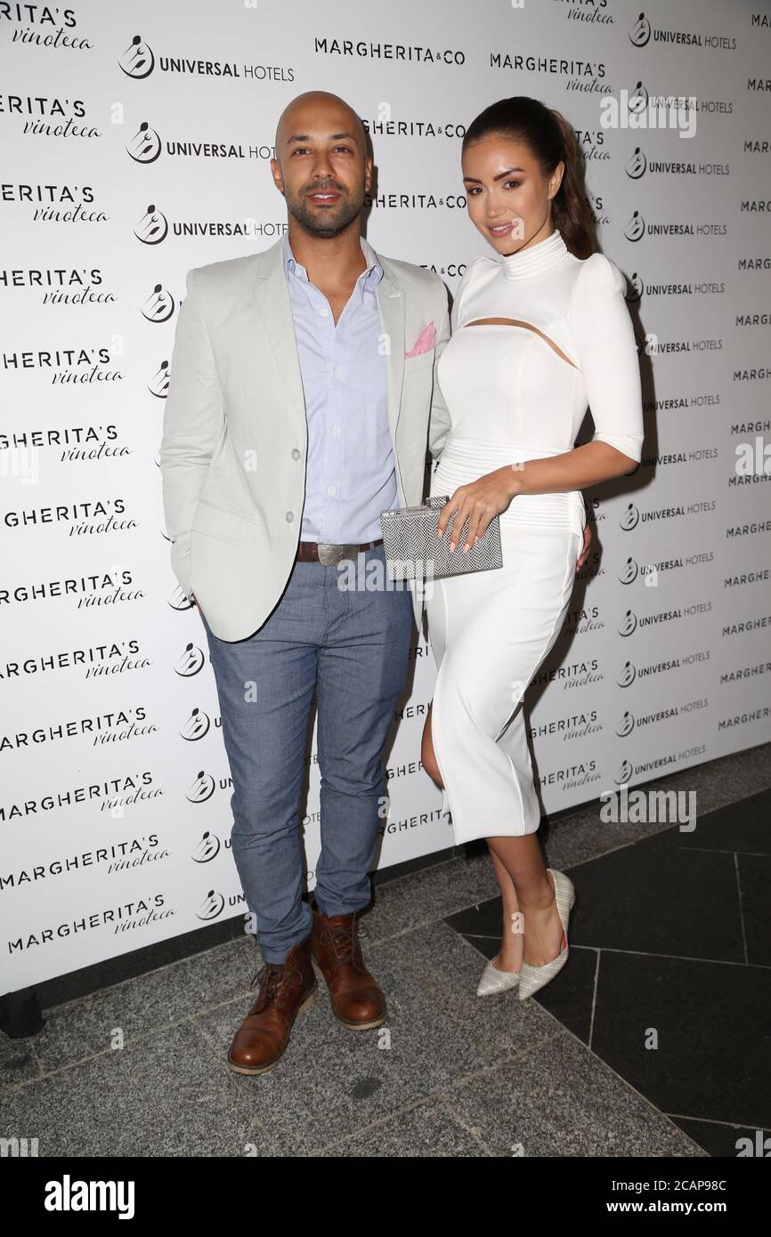 Kane Vato and Pia Muehlenbeck attend the launch of eatery Margherita & Co and Margherita's Vinoteca in Sydney, NSW, Australia. Stock Photo