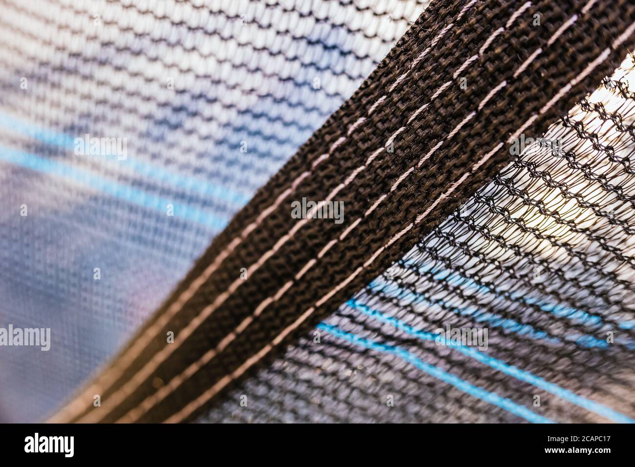 Close-up detail of the knots of a fine-mesh nylon mesh Stock Photo