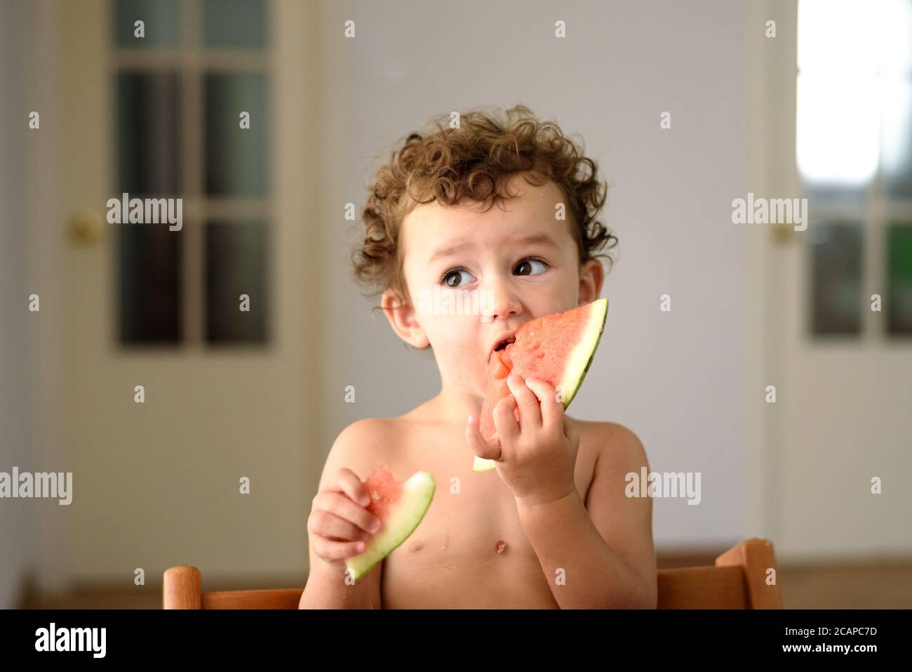 Funny adorable little girl with humorous expression during meal Stock ...