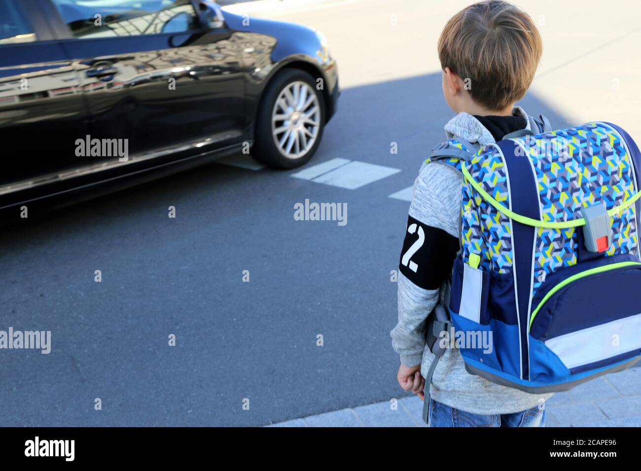 Symbol image: Schoolchild on the way to school (Model released) Stock Photo
