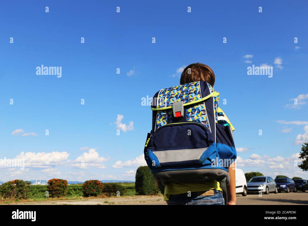 Symbol image: Schoolchild on the way to school (Model released) Stock Photo