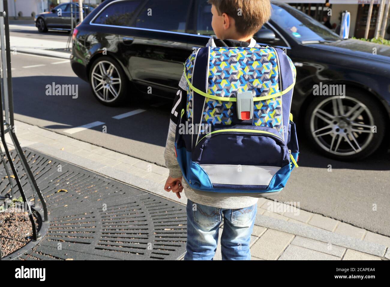 Symbol image: Schoolchild on the way to school (Model released) Stock Photo