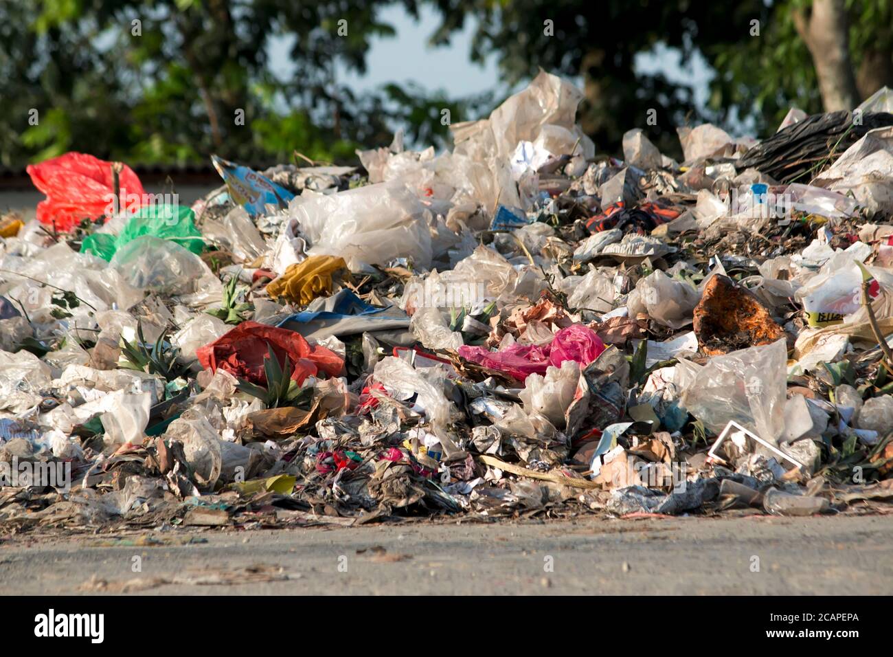 Dump with plastic bags, garbage and waste. Nature contamination and