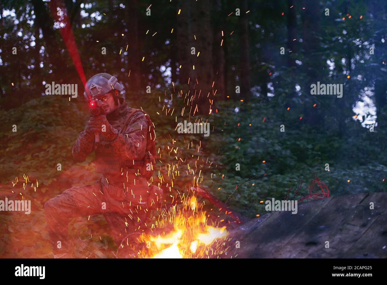 Soldier in Action at Night in the Forest Area. Night Time Military ...