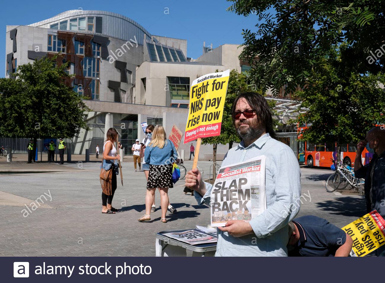 Edinburgh, Scotland, UK. 8th Aug 2020. NHS nurses, staff and supporters outside the Scottish parliament to campaign for fair pay and payrise.  Credit: Craig Brown/Alamy Live News Stock Photo