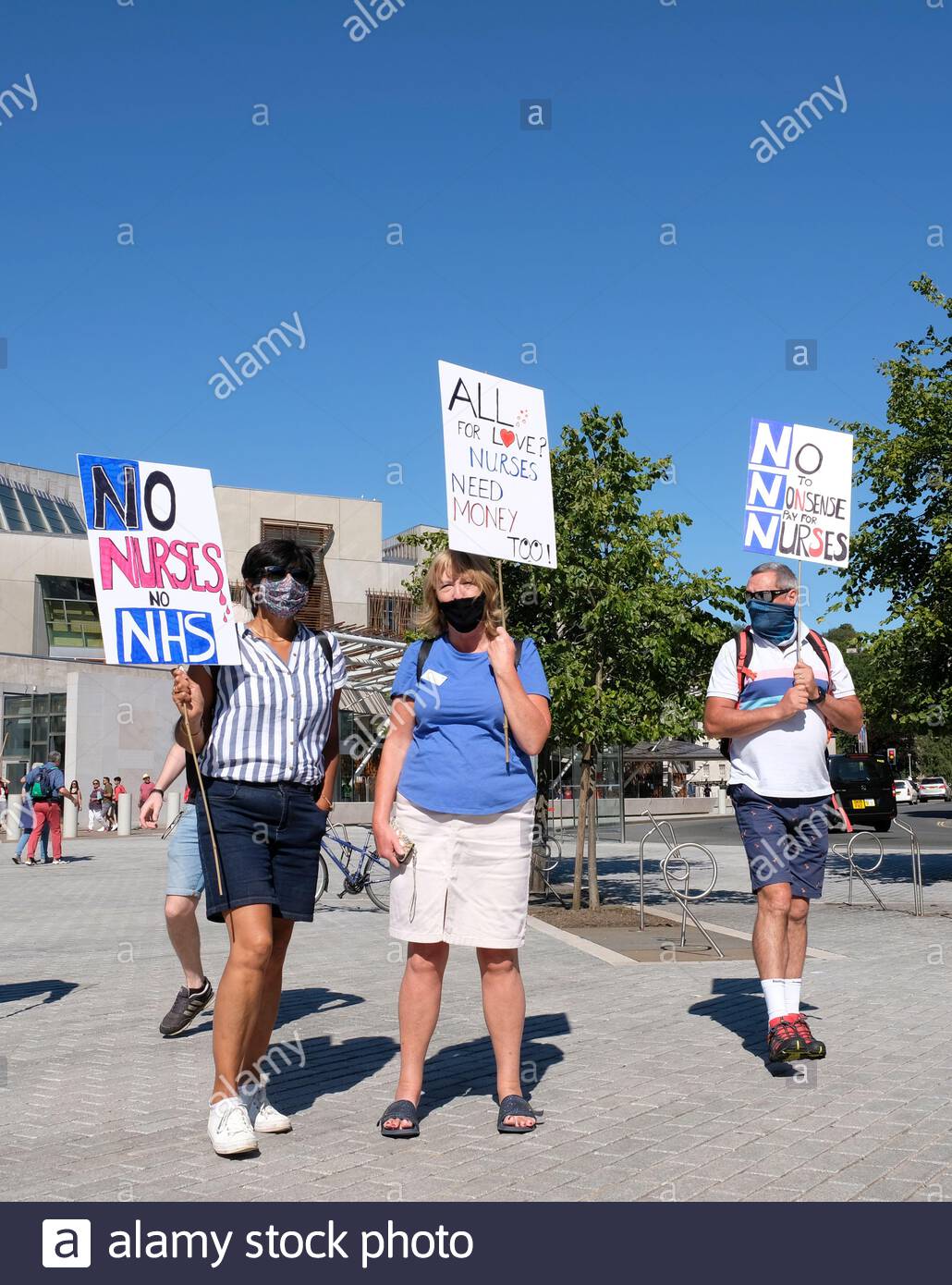 Edinburgh, Scotland, UK. 8th Aug 2020. NHS nurses, staff and supporters outside the Scottish parliament to campaign for fair pay and payrise.  Credit: Craig Brown/Alamy Live News Stock Photo