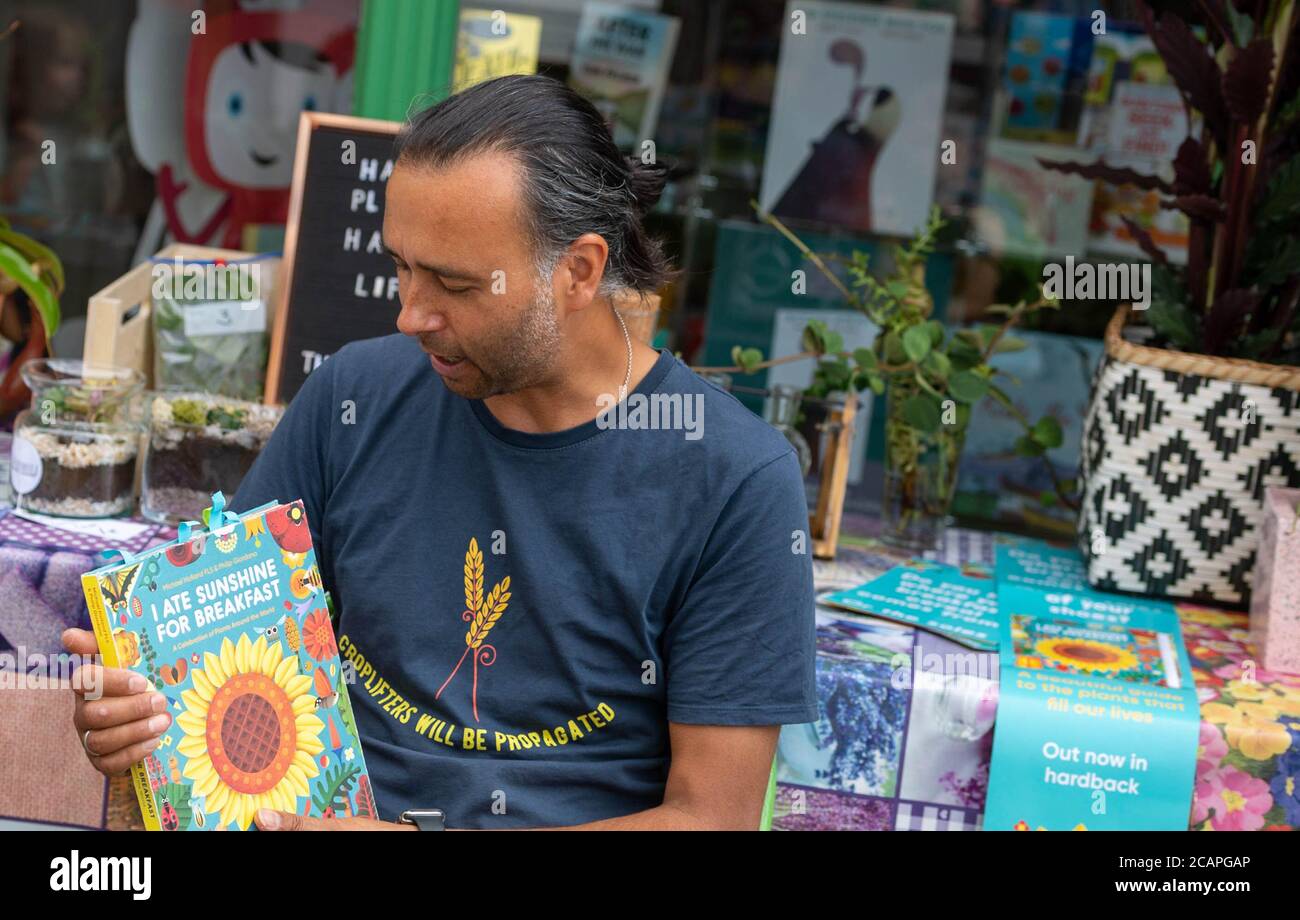 Brentwood Essex 8th August 2020 Michael Holland, Author of 'I Ate Sunshine for Breakfast' (out in April 2020), educator, photographer, wildlife gardener and former Head of Education at Chelsea Physic Garden carries out a children's event to publicise his new book at the Chicken and Frog Bookshop Brentwood Essex Credit: Ian Davidson/Alamy Live News Stock Photo