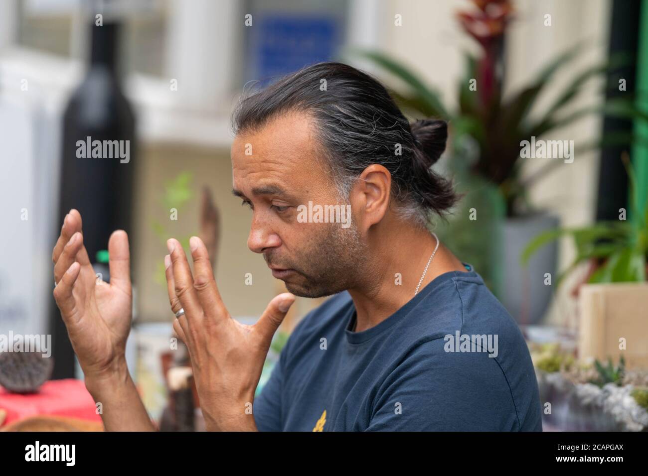 Brentwood Essex 8th August 2020 Michael Holland, Author of 'I Ate Sunshine for Breakfast' (out in April 2020), educator, photographer, wildlife gardener and former Head of Education at Chelsea Physic Garden carries out a children's event to publicise his new book at the Chicken and Frog Bookshop Brentwood Essex Credit: Ian Davidson/Alamy Live News Stock Photo