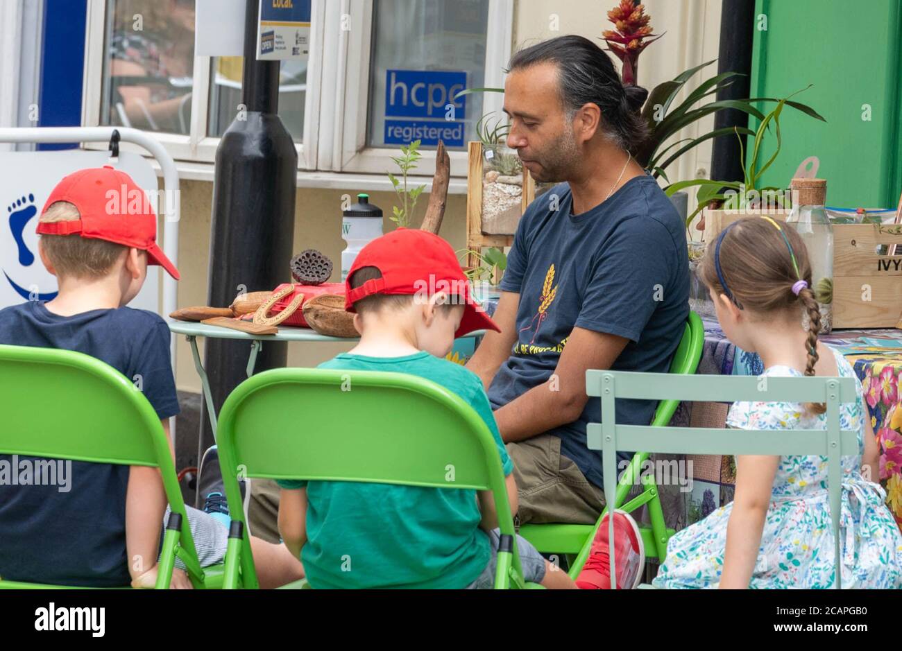 Brentwood Essex 8th August 2020 Michael Holland, Author of 'I Ate Sunshine for Breakfast' (out in April 2020), educator, photographer, wildlife gardener and former Head of Education at Chelsea Physic Garden carries out a children's event to publicise his new book at the Chicken and Frog Bookshop Brentwood Essex Credit: Ian Davidson/Alamy Live News Stock Photo