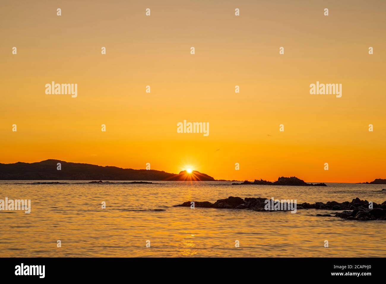 Sunrise over Burnt Island and Twillingate Harbour, Wild Cove, Newfoundland and Labrador NL, Canada Stock Photo