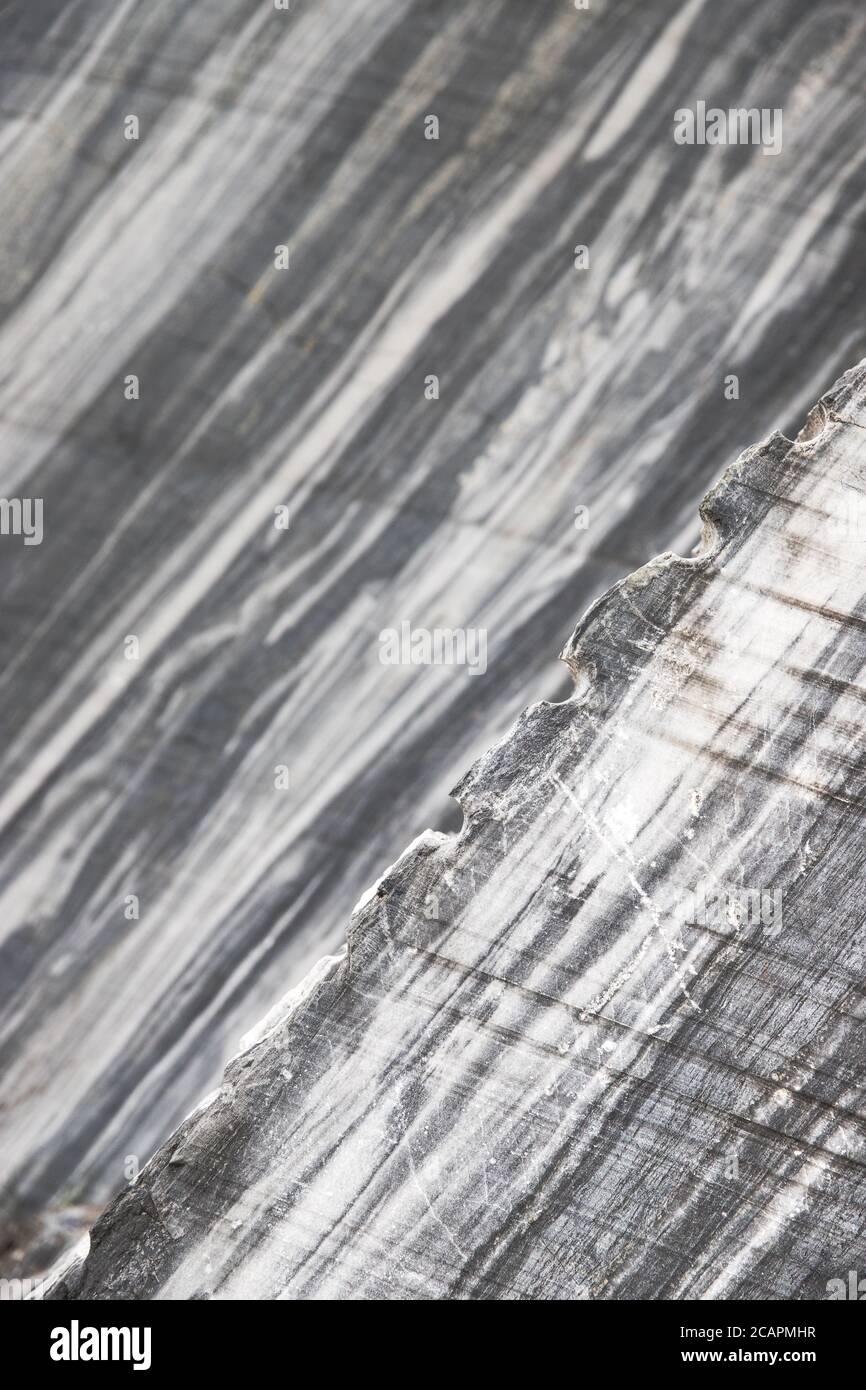 Extraction of blue marble. Marble quarry closeup.Mining industry. White