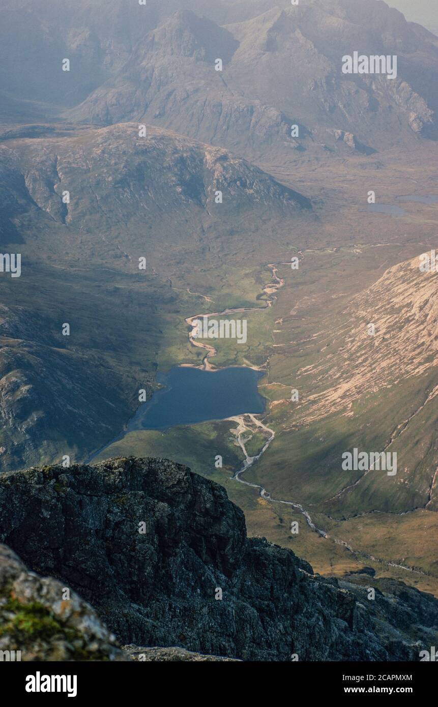 Archive image. Loch an Athain seen from the summit of Blà Bheinn (Blaven) on the Isle of Skye with the foothills of the black cuillin in the background, c.1995 Stock Photo
