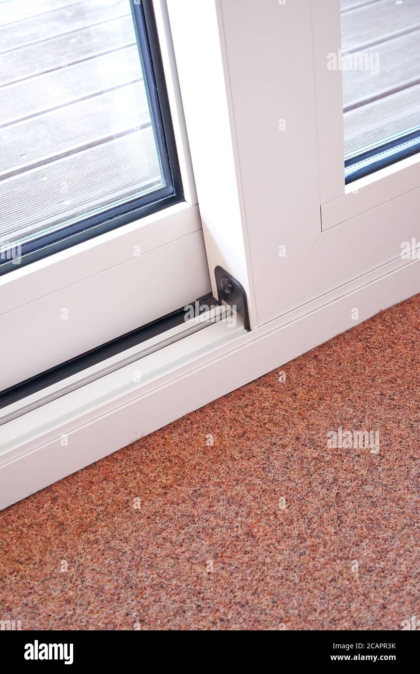 Sliding glass door detail and rail embed in floor Stock Photo Alamy